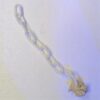The white seahorse chain ornament at the Abyss